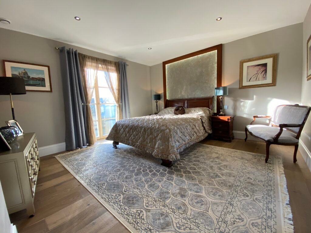 Elegant bedroom renovation in Purley with natural light and bespoke finishes by Torwood Interiors.