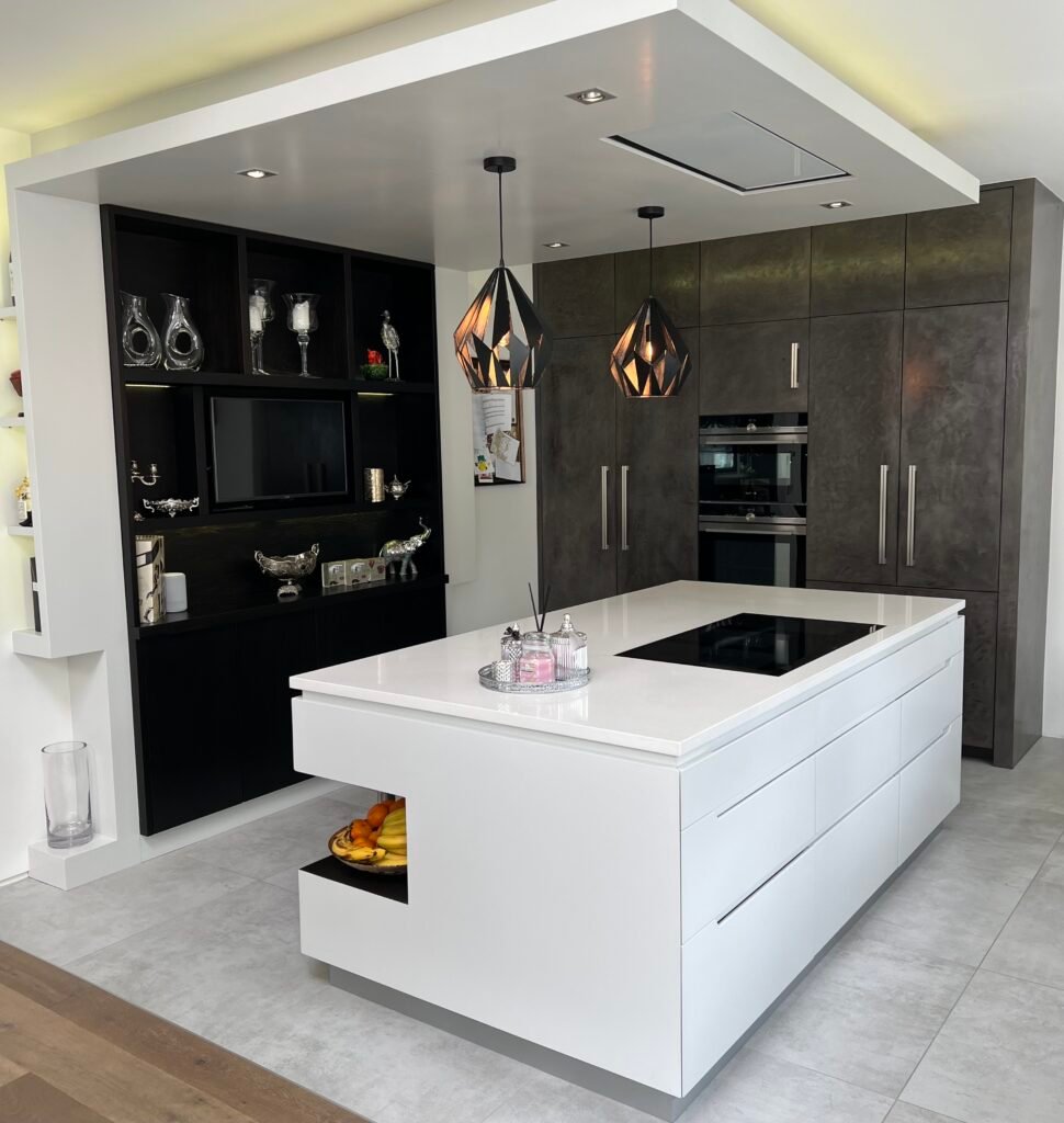Bespoke kitchen design in Purley with minimalist cabinetry and built-in appliances by Torwood Interiors.