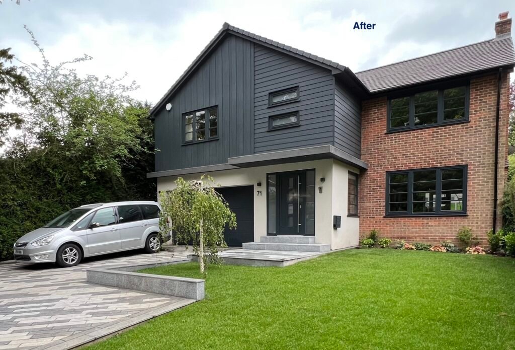 Front view of the renovated and extended house in Caterham by Torwood Interiors, featuring timber cladding and linear metro granite driveway.