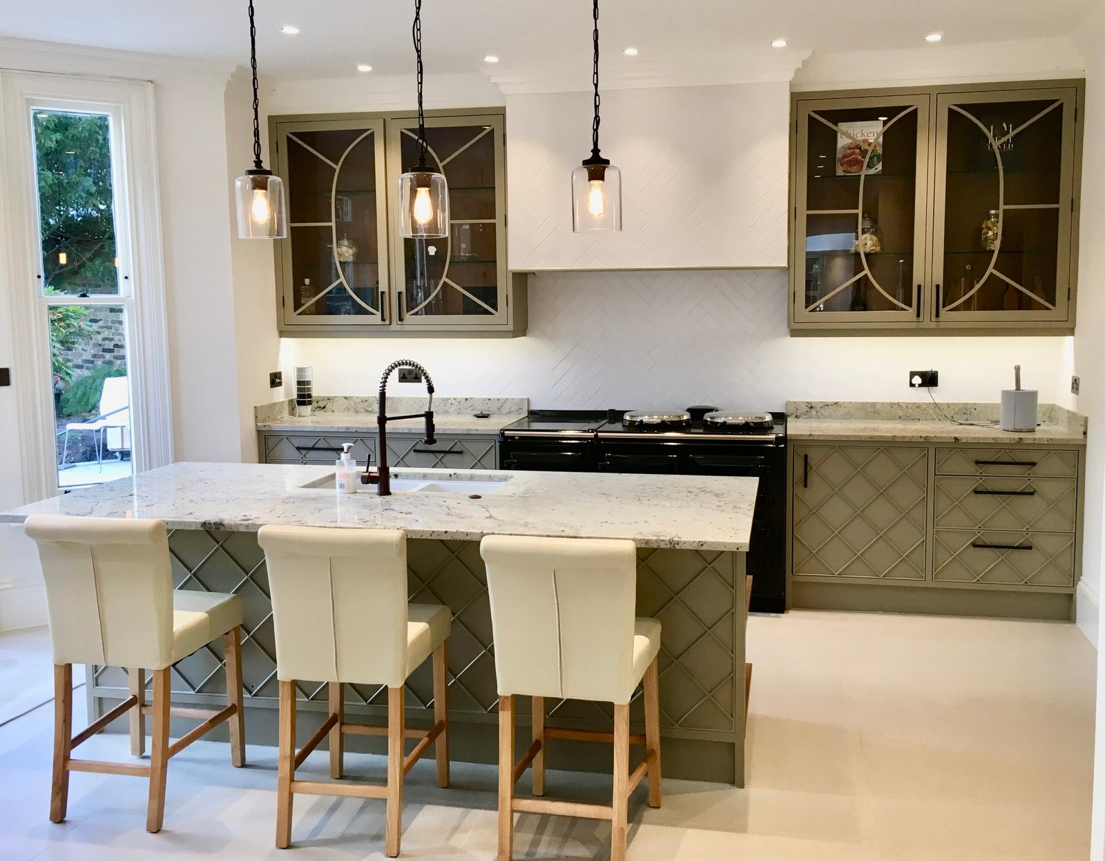 Modern kitchen fitted by Torwood in Richmond with stone worktops and bespoke cabinetry
