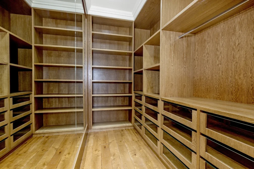 Bespoke oak wardrobe with glass drawers by Torwood Interiors, Richmond