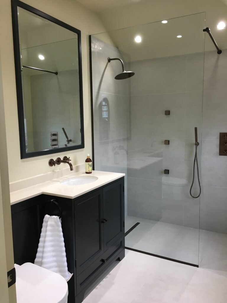 Ensuite bathroom with walk-in shower and bespoke vanity unit Richmond TW9